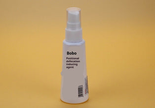 Pet positioning defecation inducer